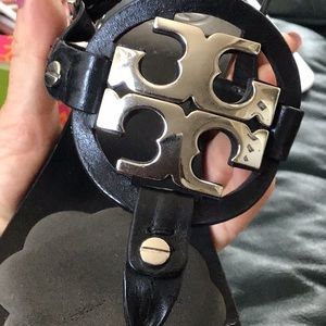 Tory Burch black sandals with silver emblem